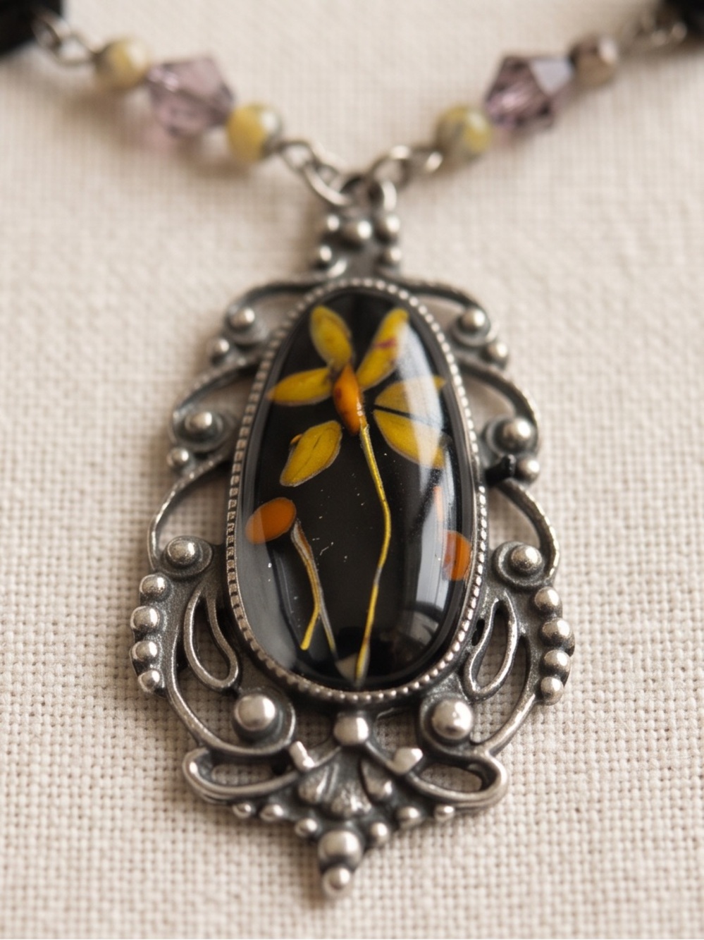 Vintage Style Silver Tone Floral Pendant Necklace with Black and Purple Beads